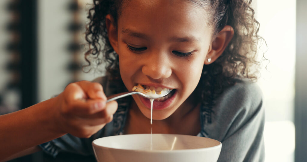 Child eating a dairy-based meal