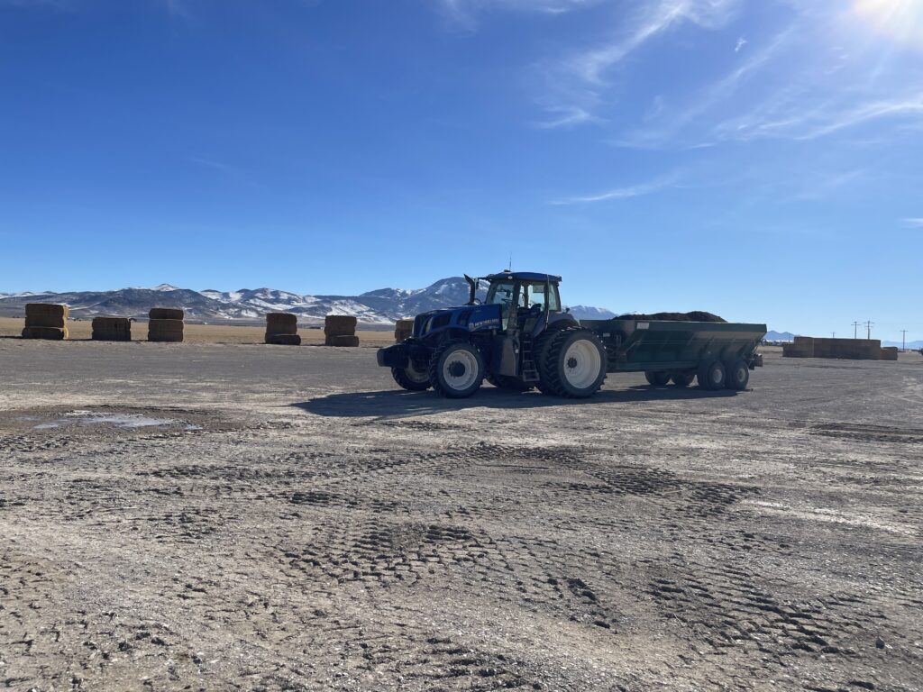 Farm equipment and hay storage area at Silver Lion Farms in Nevada’s high desert